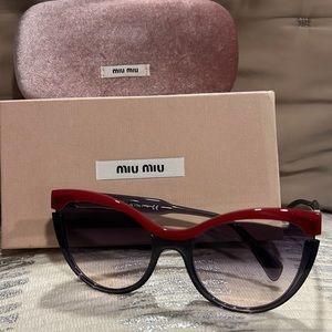 MIU MIU Women’s cat eye sunglasses
